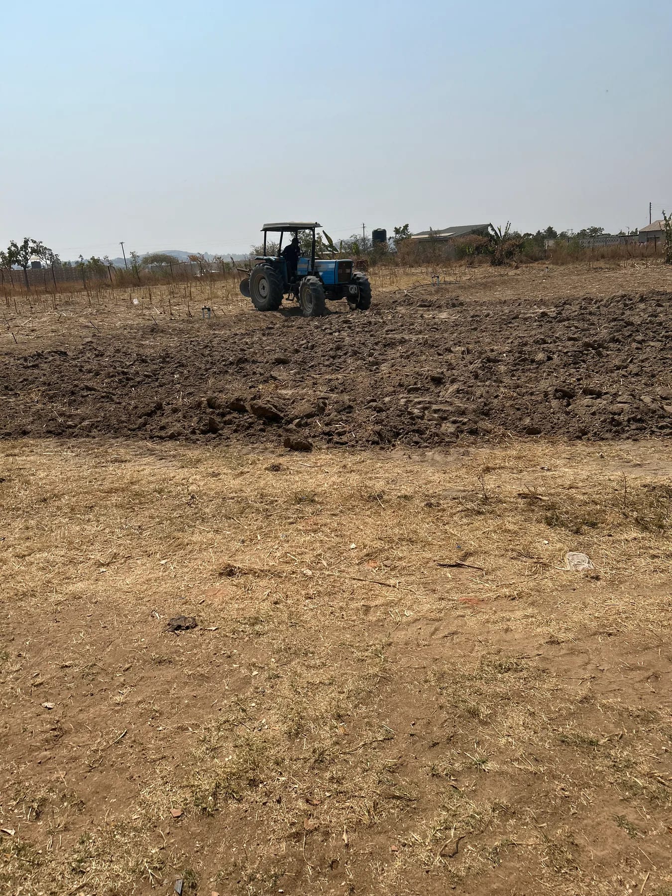 A tractor preparing the FarmView potato field